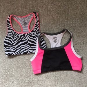 Two justice girls sports bras one zebra one multi colored